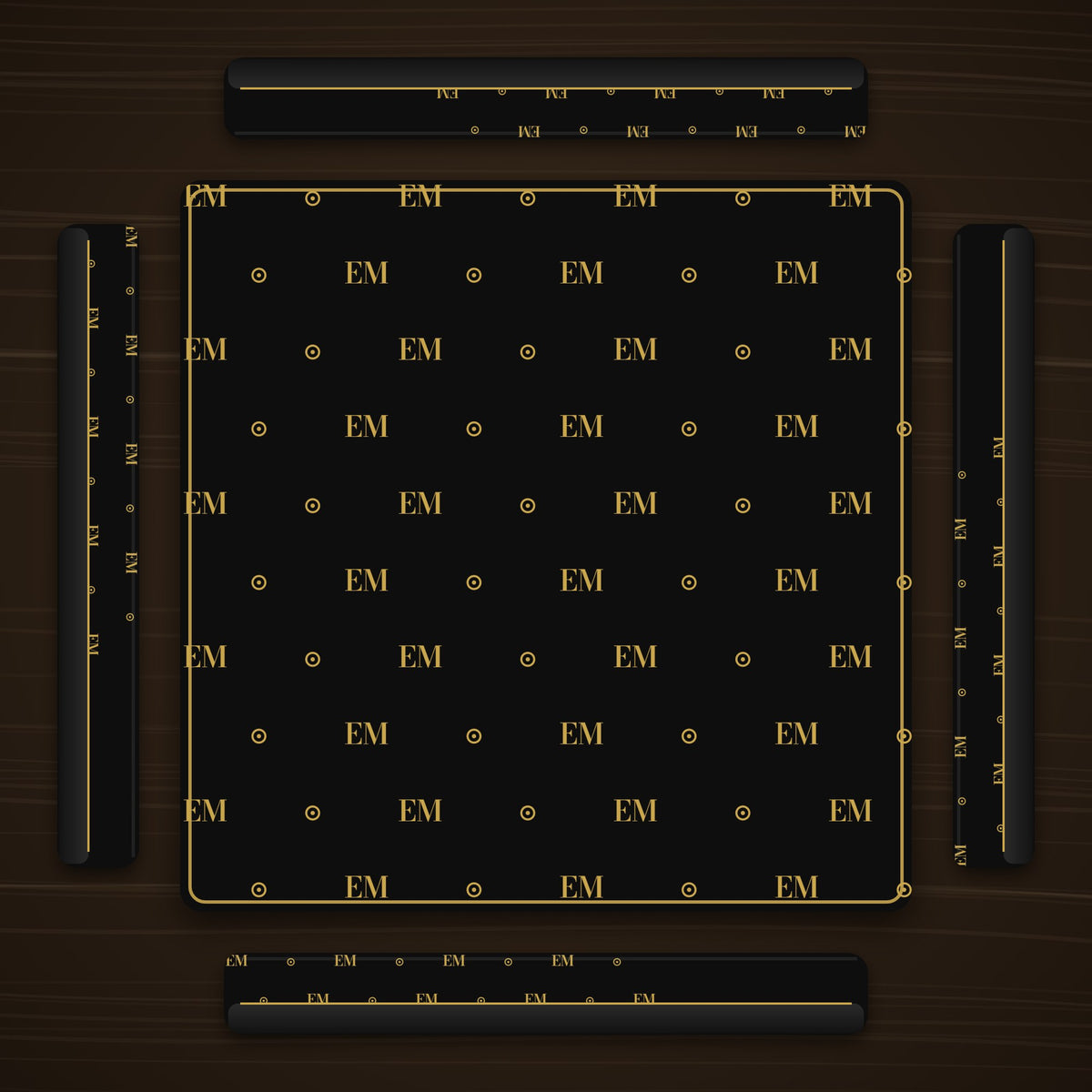 Four black and gold mahjong racks around a matching mat